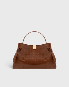 JONES + CO Gyoza pouch in brown embossed leather with a gold clasp and structured handle
