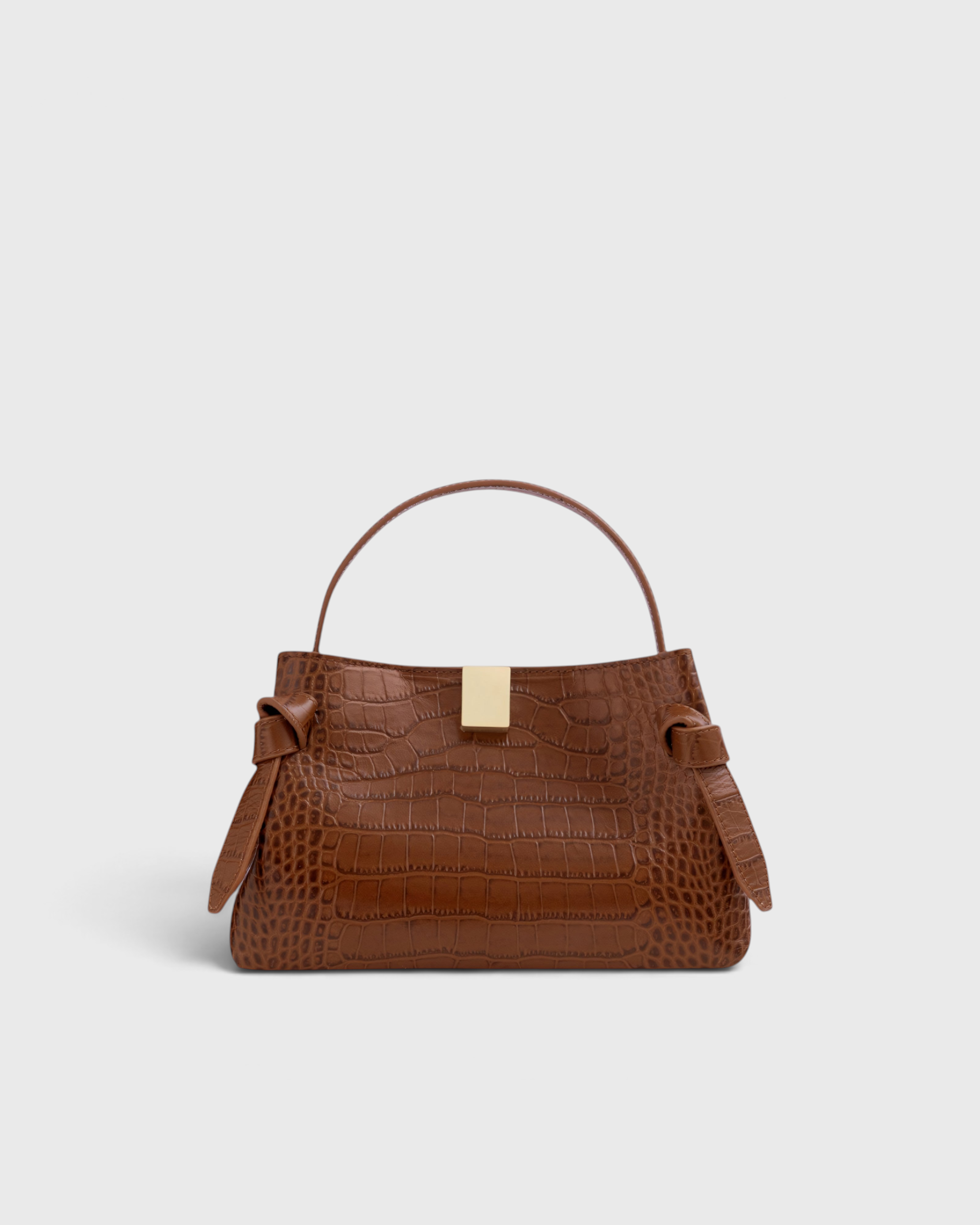 JONES + CO Gyoza Mini handbag in brown embossed Italian leather with gold-tone hardware and top handle