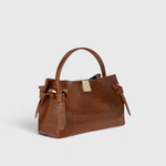 JONES + CO Gyoza Mini handbag in Sierra brown embossed Italian leather with gold-tone hardware and top handle.