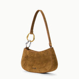 Three-quarter view of the STAUD Ollie Bag in Cigar suede with polished leather trim