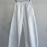Arc Pants - Milk hanging on hanger