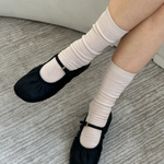JONES + CO Le Bon Shoppe Trouser Socks in Eggnog cream, styled with dress shoes.
