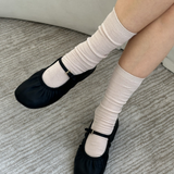 JONES + CO Le Bon Shoppe Trouser Socks in Eggnog cream, styled with dress shoes.