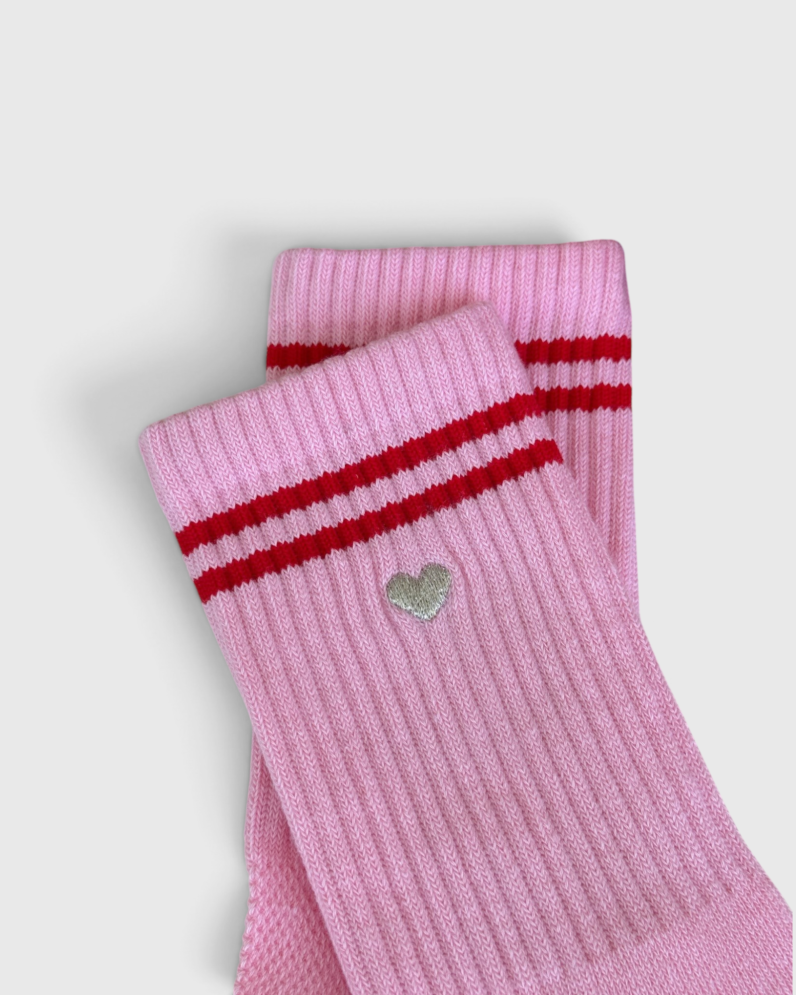JONES + CO Le Bon Shoppe Embroidered Boyfriend Socks in Amour Pink, detail of the embroidered heart below the stripes.