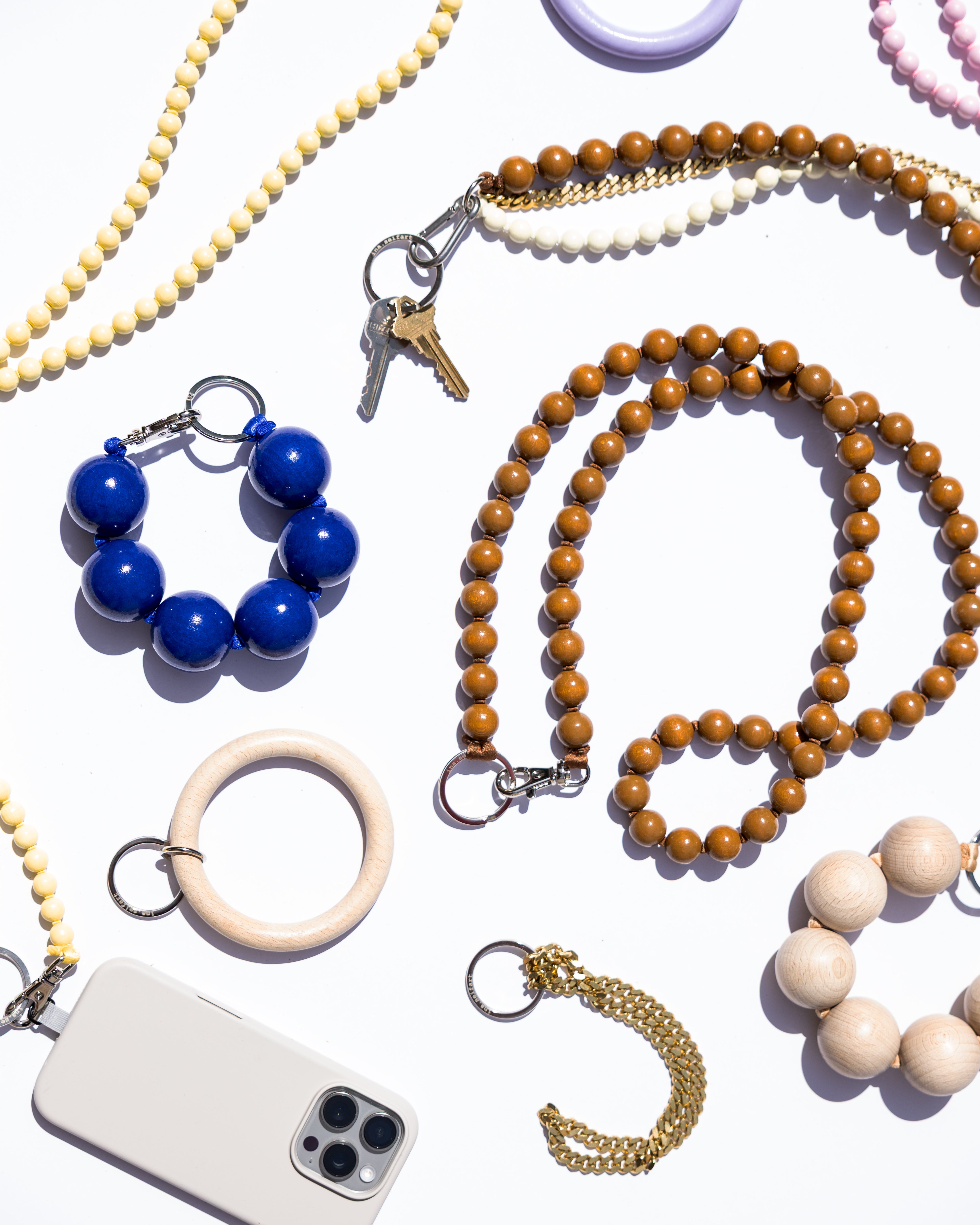 Collection of beaded ina.seifart products on a white background