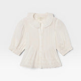 White blouse with a collar on a white background