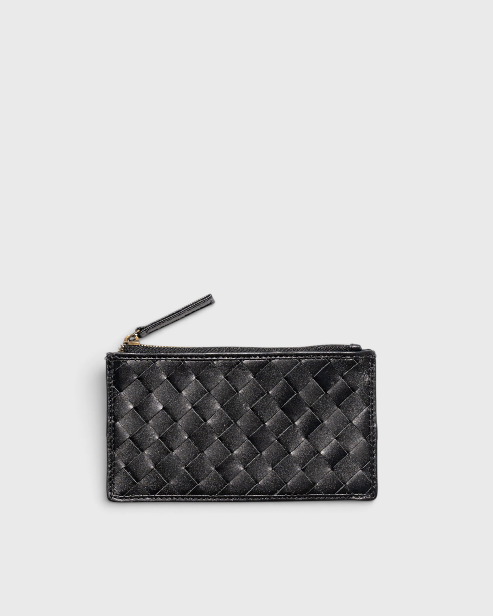 JONES + CO Odin black woven leather card case with a zip pouch, minimalist design on a white background.