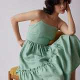Holly Dress - Green model sitting down 