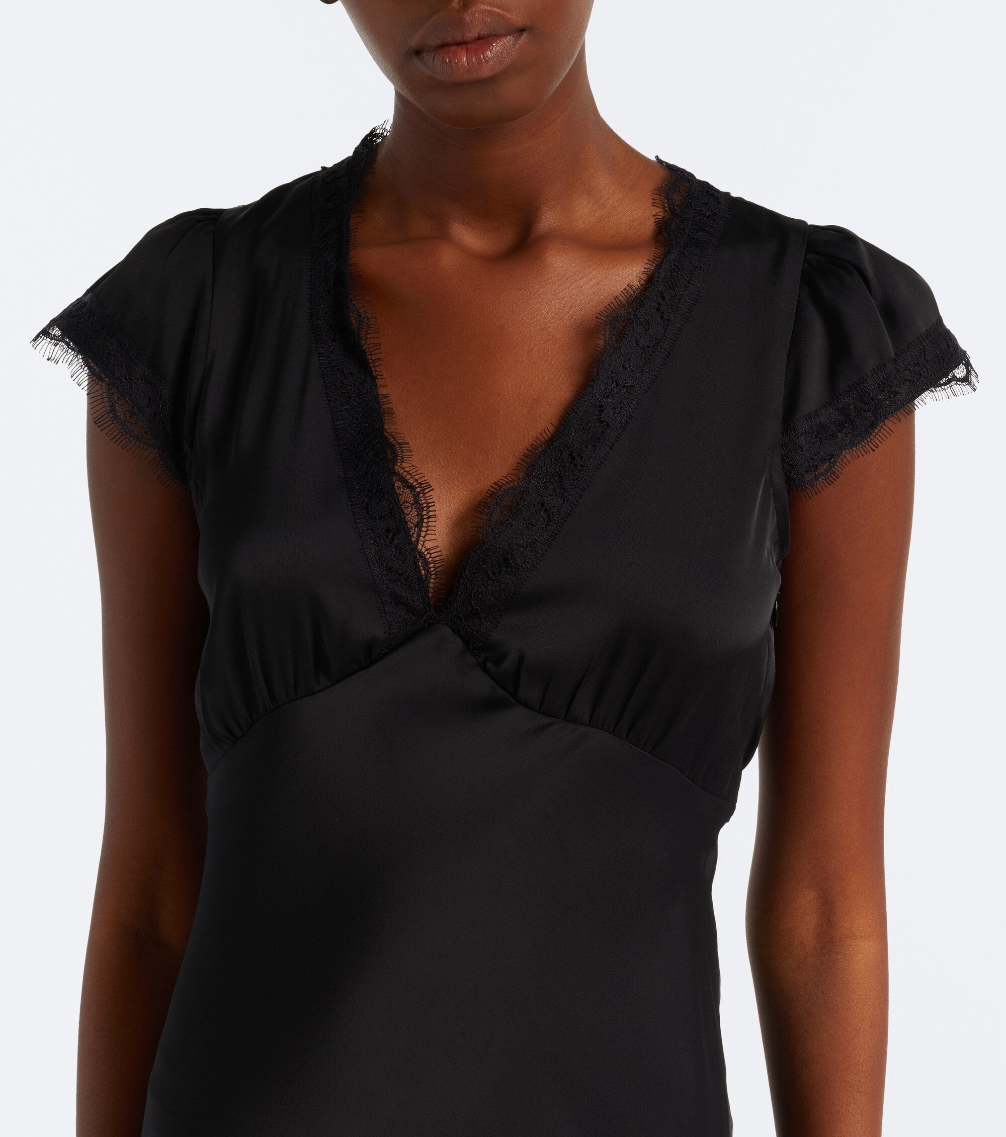 Faithfull the Brand Mina Midi Dress in Black - lace-trimmed V-neckline and cap sleeve detail