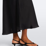 Faithfull the Brand Mina Midi Dress in Black - bias-cut satin hem detail