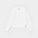 JONES + CO Pia Cotton Sweater in bone white. Features a crew neckline, relaxed sleeves, and cropped silhouette.