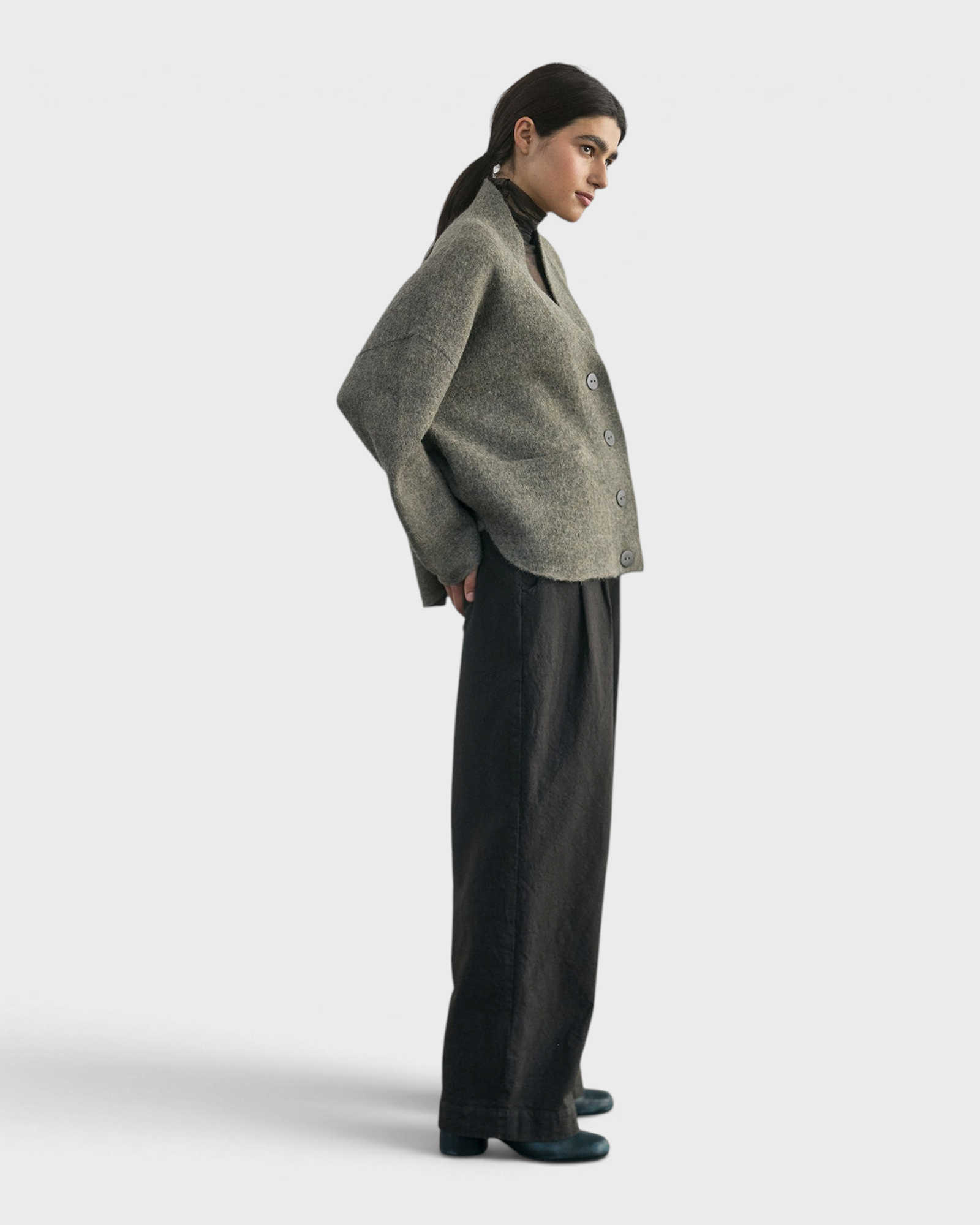 SISA Felted Alpaca Cardigan in Moss, side view showing the dropped shoulder
