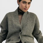 SISA Felted Alpaca Cardigan in Moss, front view buttoned, seated