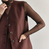 SISA Silk Tulle Beatle in Eggplant, layered under a felted vest, front detail