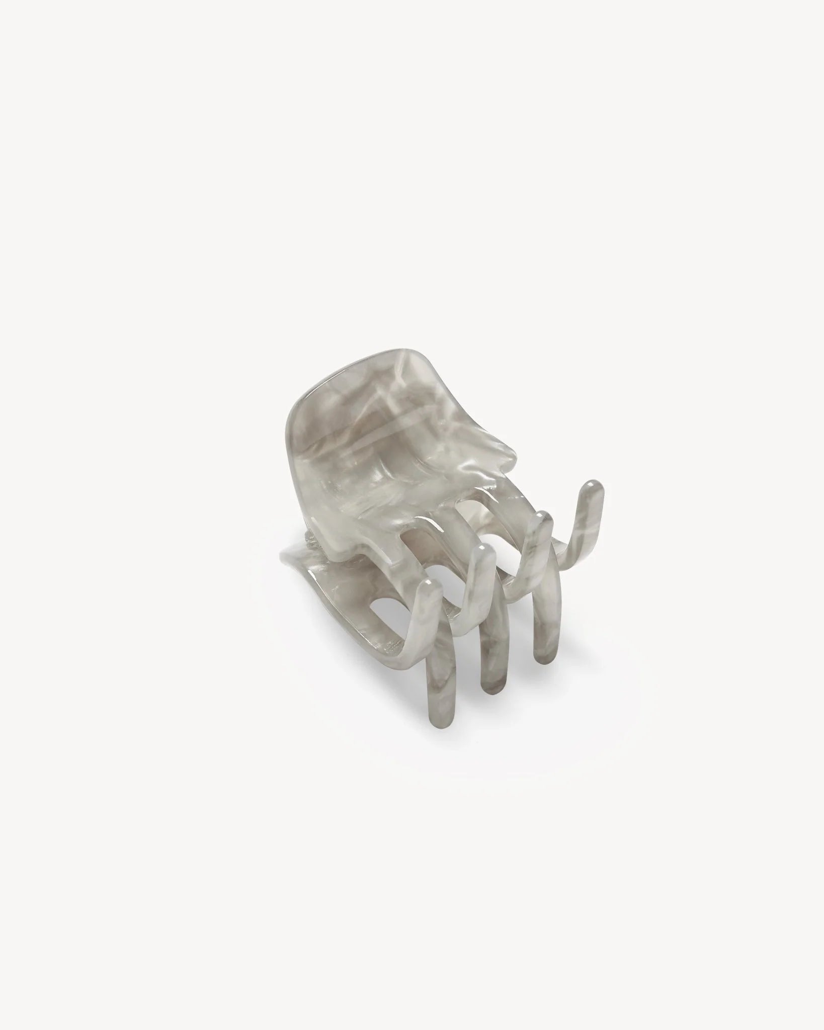 Grey clip in a white background