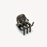  Tortoiseshell hair clip on a white background