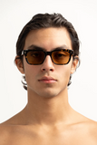 Comanche Sunglasses - Chelonian straight on view on male model 