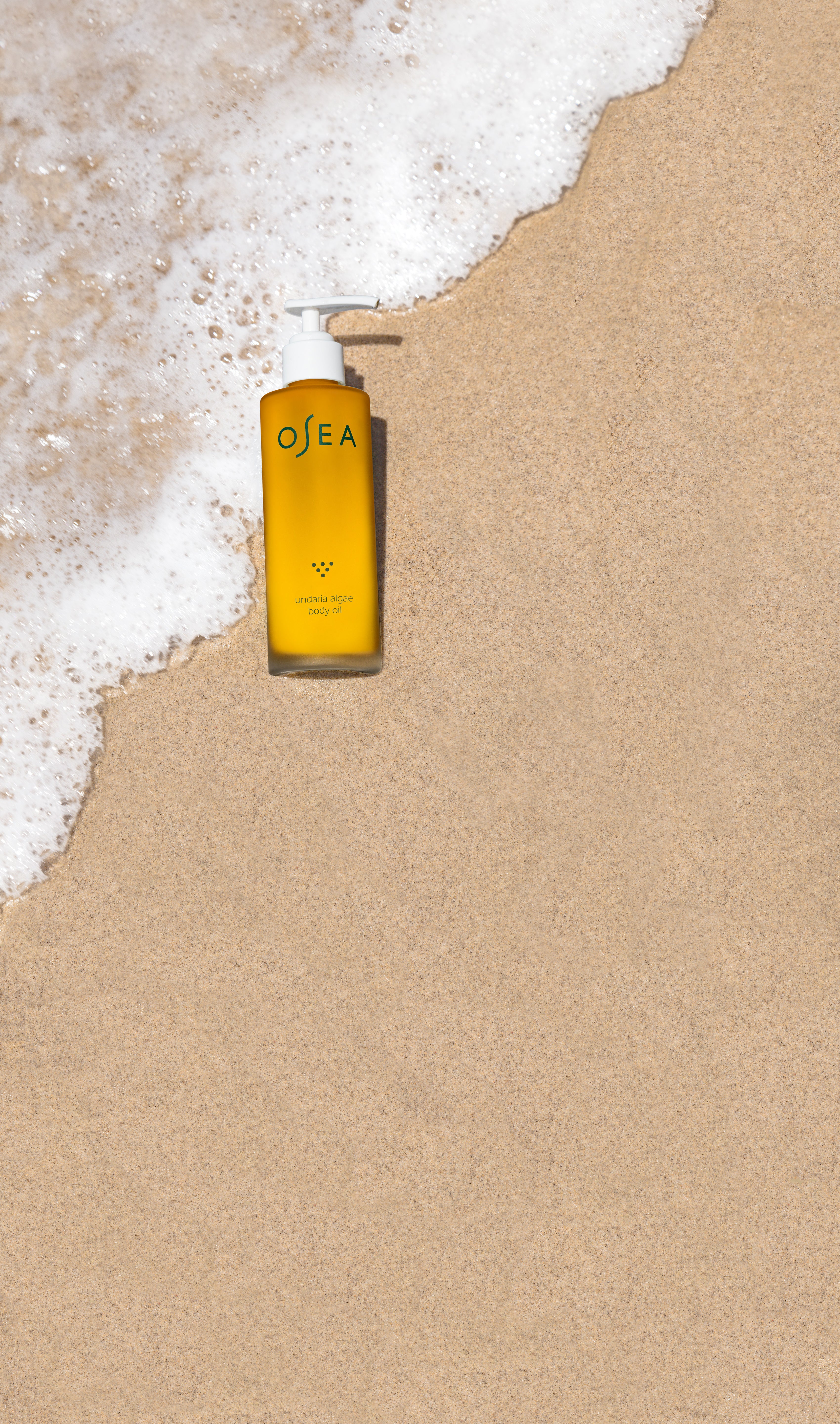 Undaria Algae Body Oil on beach