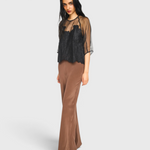 MIRTH Bari Organza Top in Black Waterlily — worn, three-quarter view