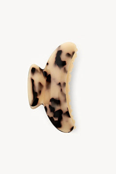 Claw clip with a tortoiseshell pattern on a white background