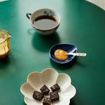 havsno sea salt flakes being garnished on chocolate and an egg