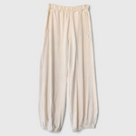 JONES + CO natural balloon pants with high elastic waist, side pockets, and gathered elastic leg openings.