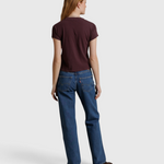 JONES + CO Alanis V Neck tee in cherry lacquer recycled cotton worn with blue jeans, back view