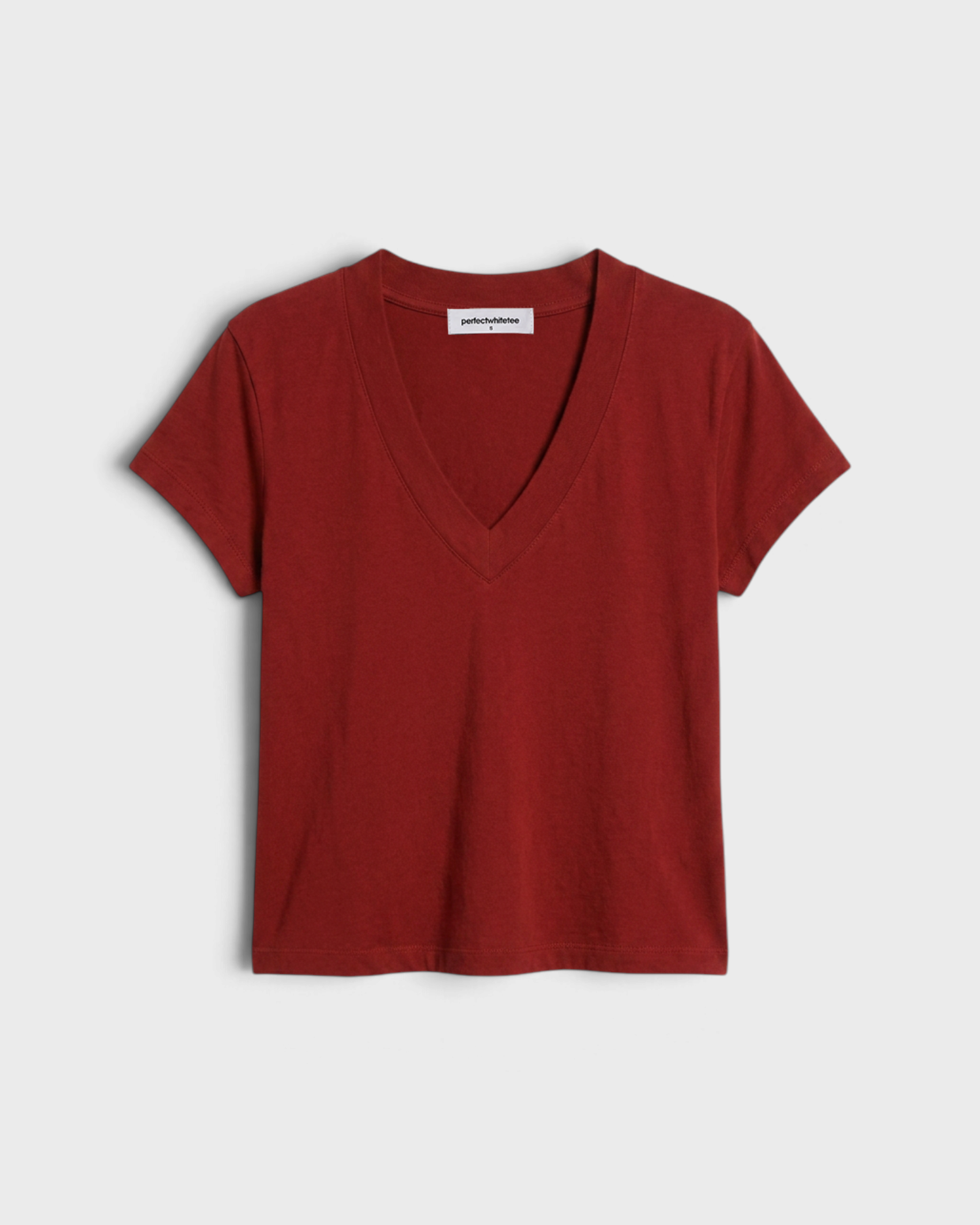 JONES + CO Alanis V-neck t-shirt in ruby red recycled cotton with short sleeves and a relaxed fit.
