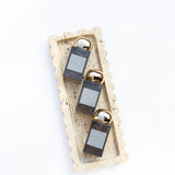 512 Tray - Travertine with perfume on it 