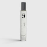 JONES + CO Flower Eater natural perfume oil roll-on in a sleek clear glass bottle with a grey cap.