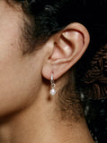 Small Sterling Silver Pearl Hoops on ear