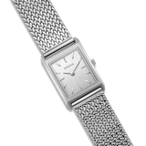 Silver watch with mesh band on a white background