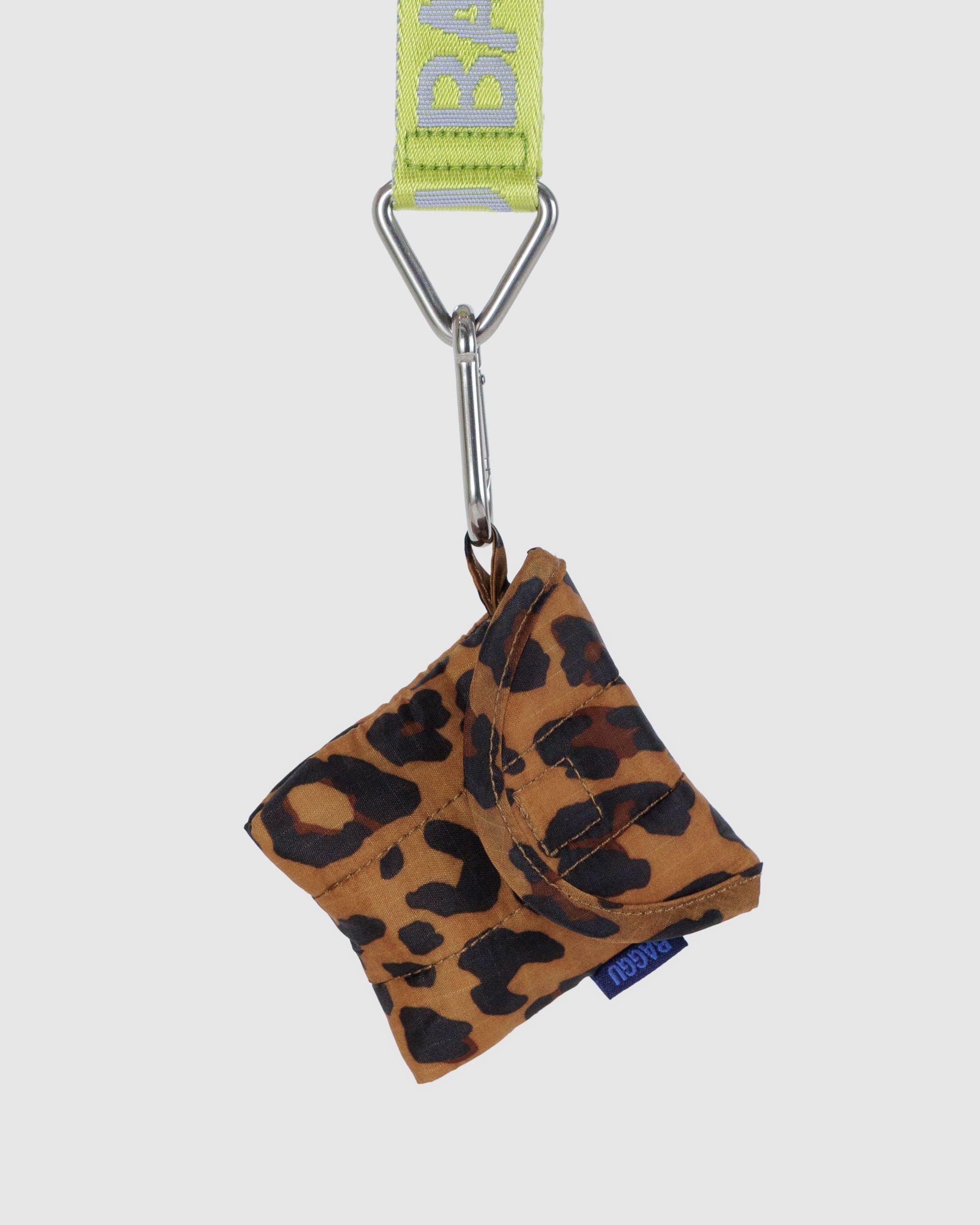 Baggu Puffy Earbuds Case in leopard, keychain loop detail