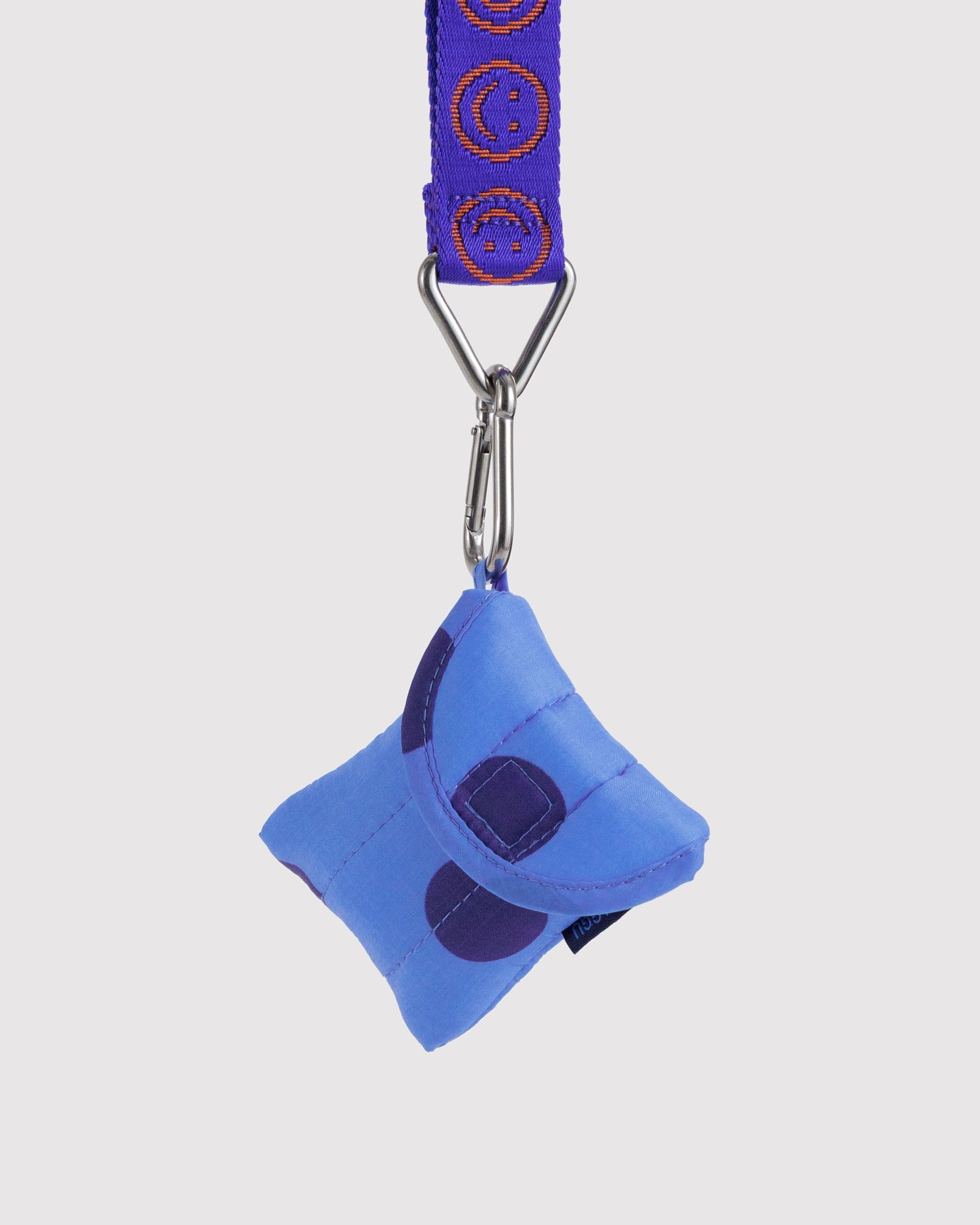 Baggu Puffy Earbuds Case in blue polka dot, second view