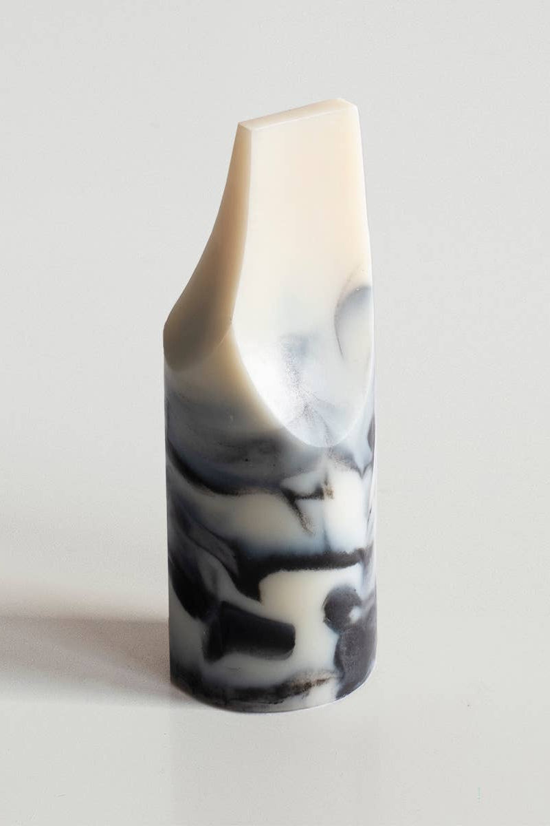 Marble-patterned soap on a light gray background