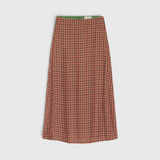 JONES + CO Demi midi skirt in Vintage Parlor geometric print with a bias cut and fluid silhouette.