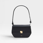 A black leather shoulder bag with a metal buckle, an adjustable strap, and the CLOSED logo embossed on the front.