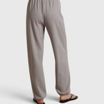 JONES + CO Dre sweatpants in cloud gray, featuring a comfortable elastic waistband and relaxed fit, back view.