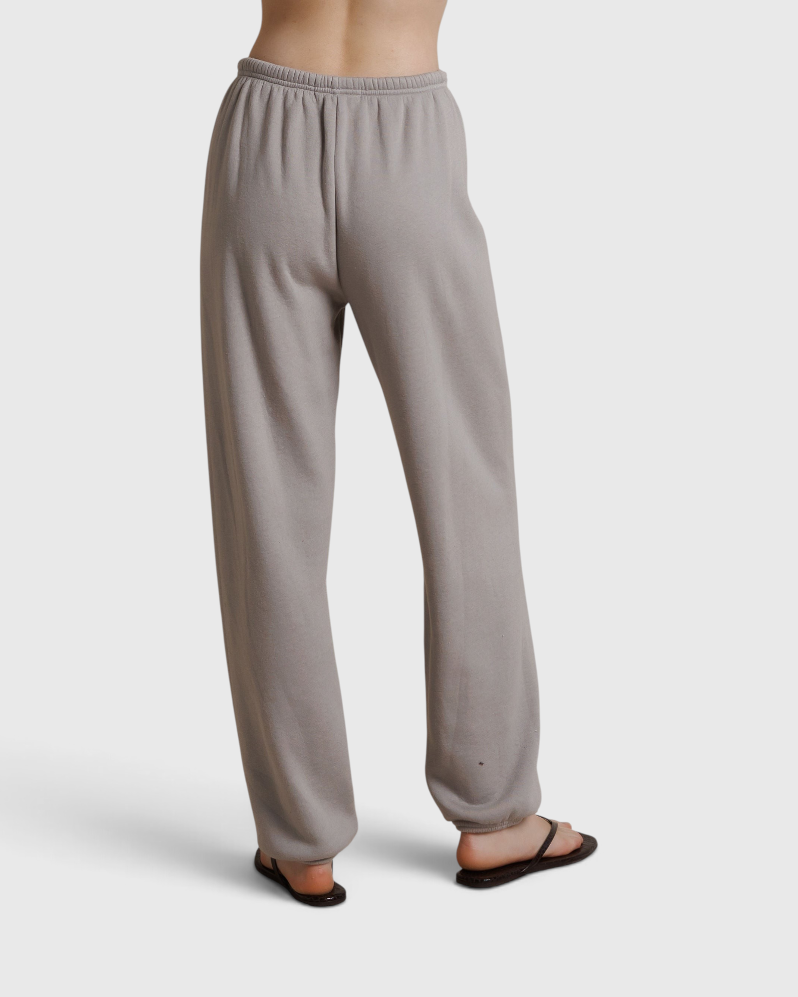 JONES + CO Dre sweatpants in cloud gray, featuring a comfortable elastic waistband and relaxed fit, back view.