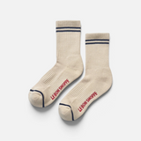 JONES + CO Boyfriend socks in cashew beige with navy blue stripes, breathable mesh top, and red logo branding.