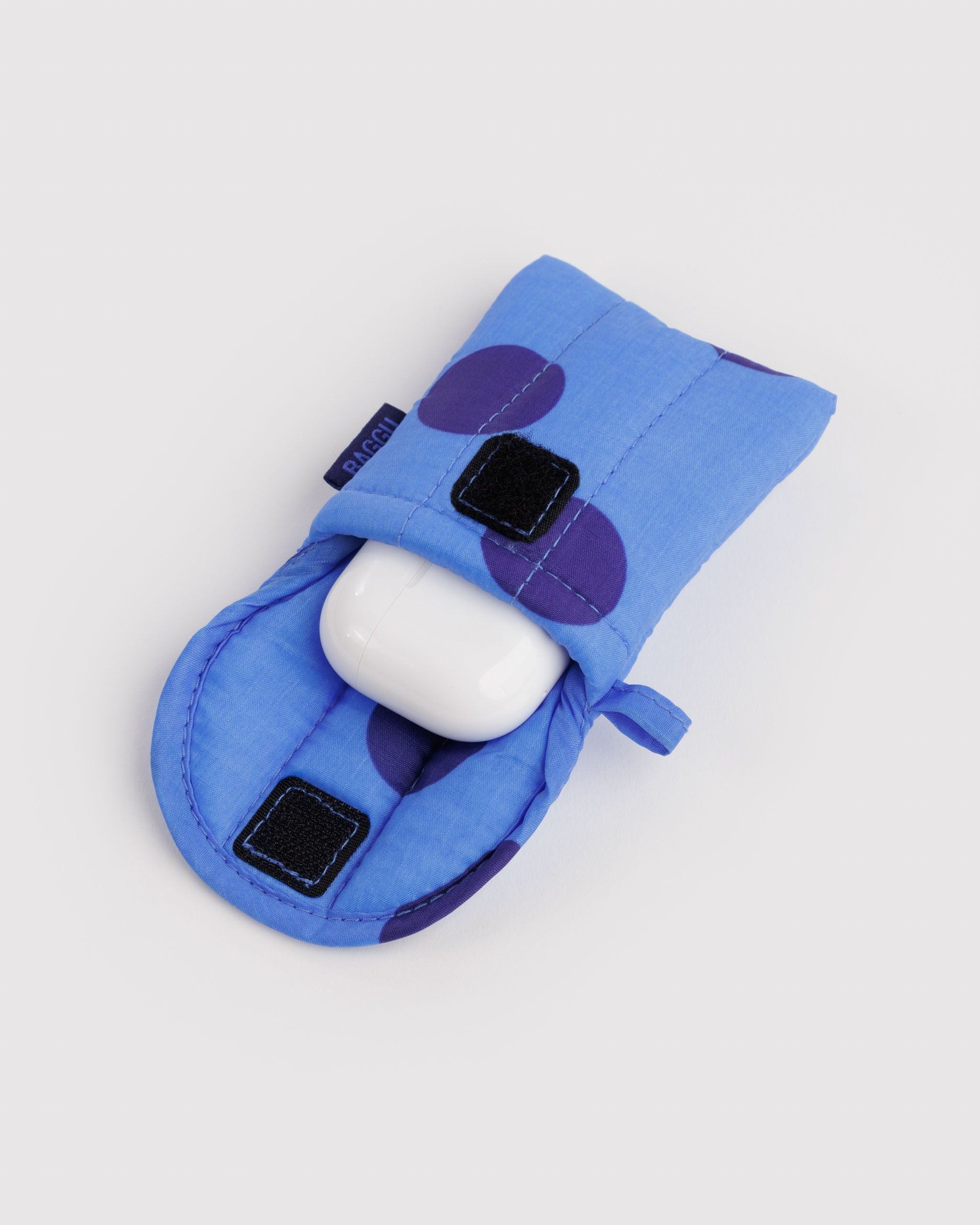 Baggu Puffy Earbuds Case in blue polka dot, keychain loop detail