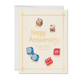 Greeting card with dice illustrations and 'Happy Anniversary' text on a white background