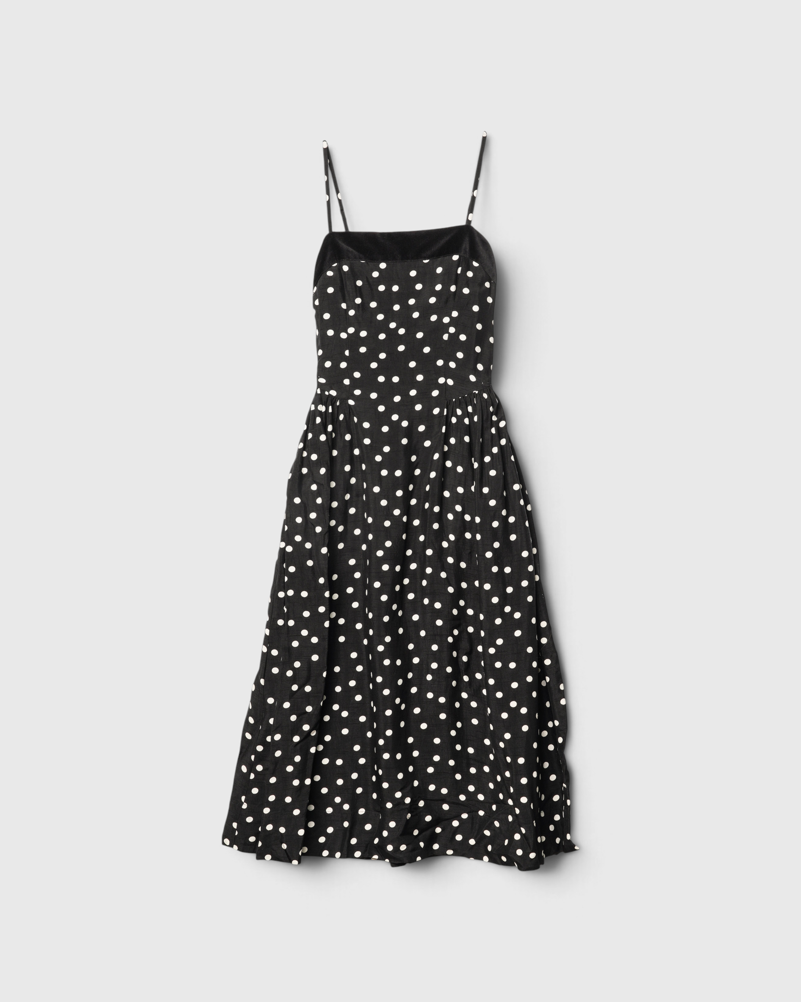 Ciao Lucia Anneli Dress in black polka dot, flat lay front view, spaghetti-strap midi dress