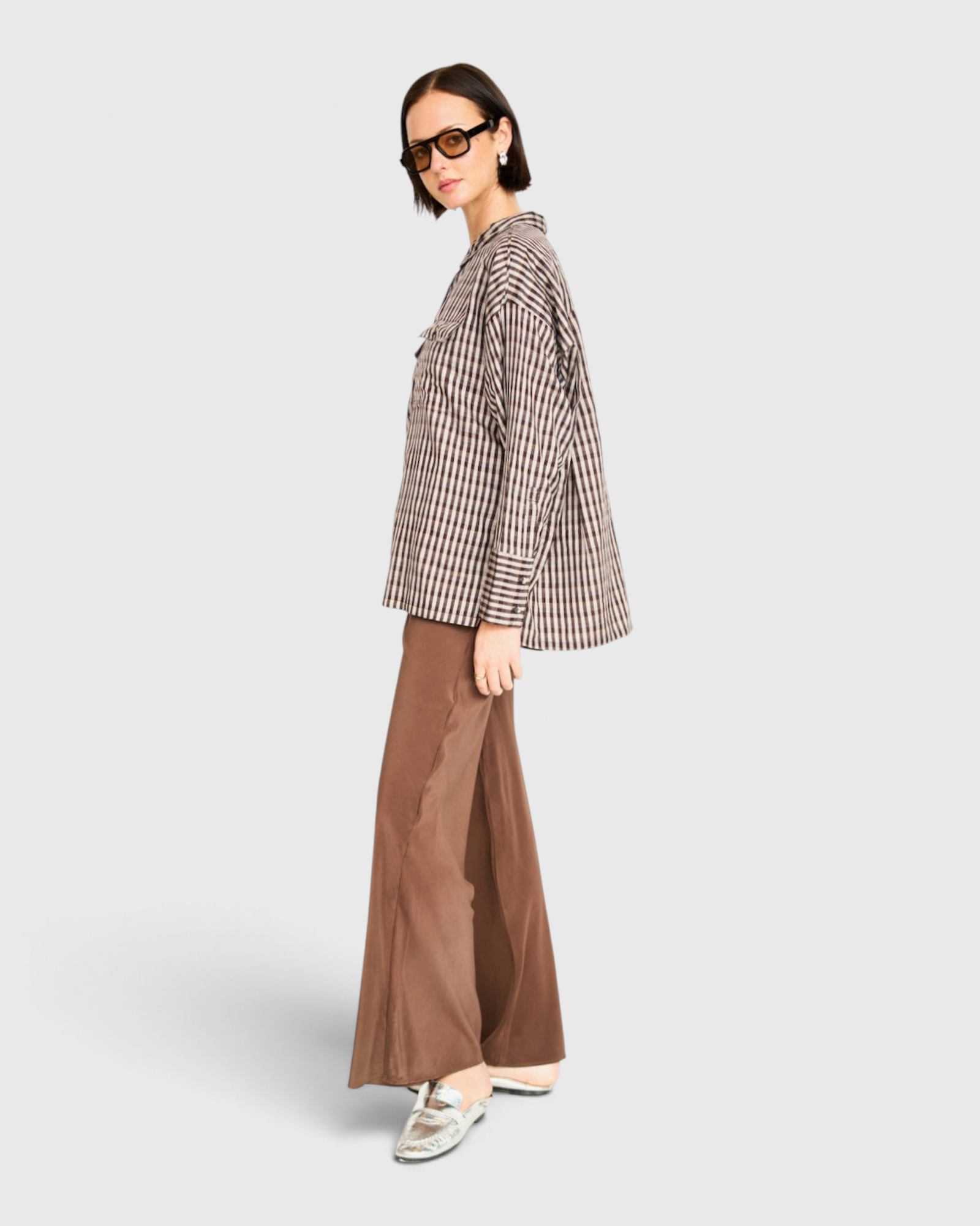 MIRTH Cardiff Silk Pant in Cocoa on model, side view showing the wide leg