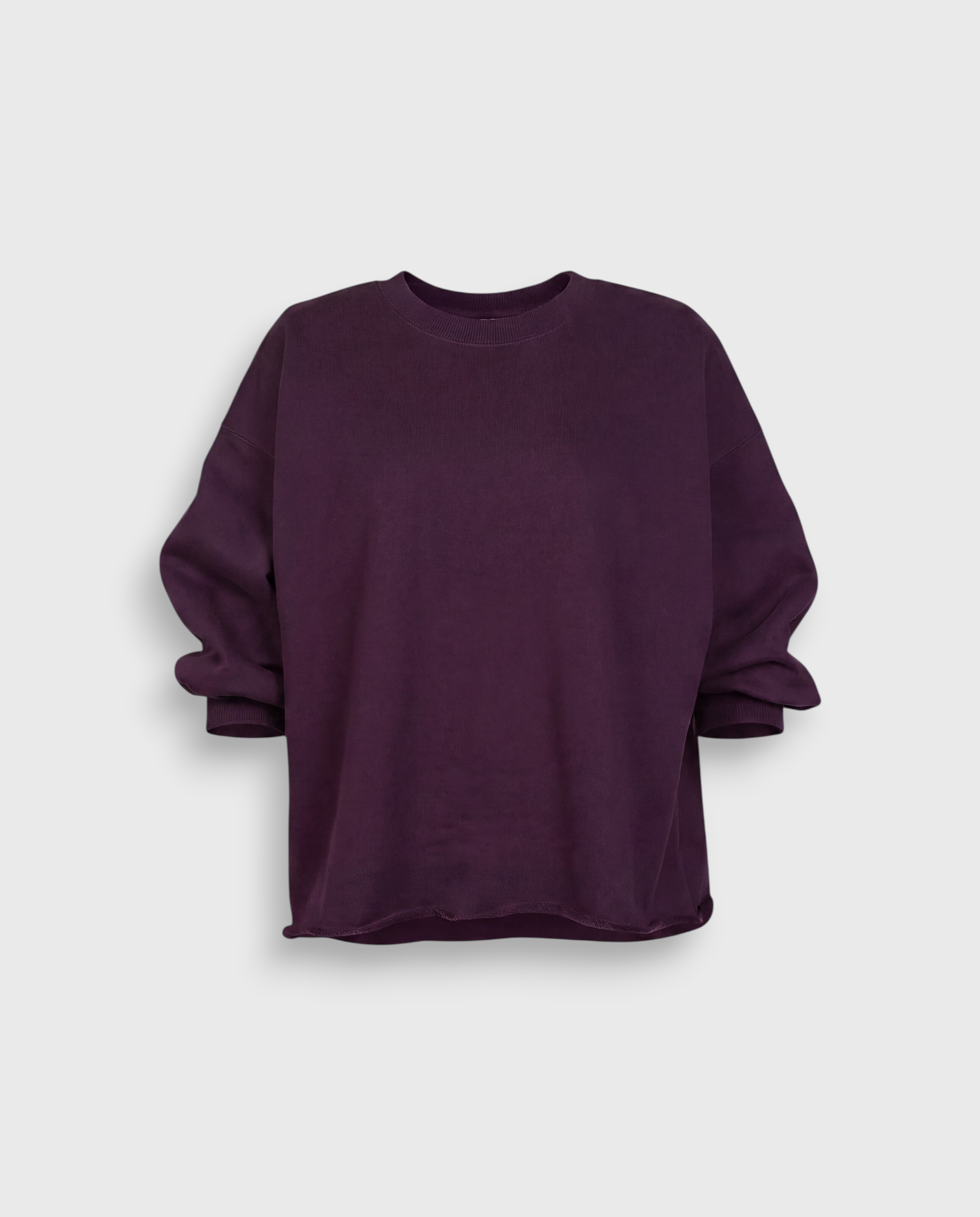 JONES + CO Rachel Comey Fond crewneck sweatshirt in plum featuring drop shoulders and a raw edge hemline.