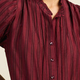 Trovata Mira Blouse in Garnet Stripe — front detail of pintucks and placket