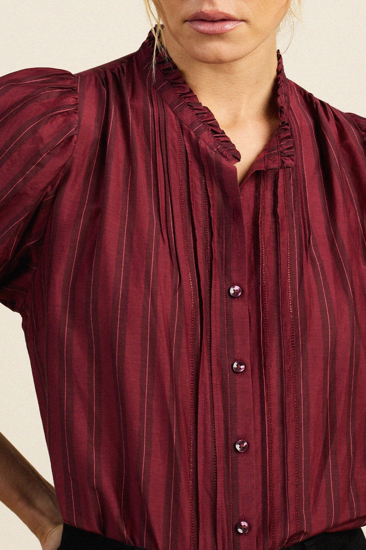 Trovata Mira Blouse in Garnet Stripe — front detail of pintucks and placket