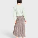 MIRTH Santander Silk Skirt in Shadowline Plaid — worn with a pale green top