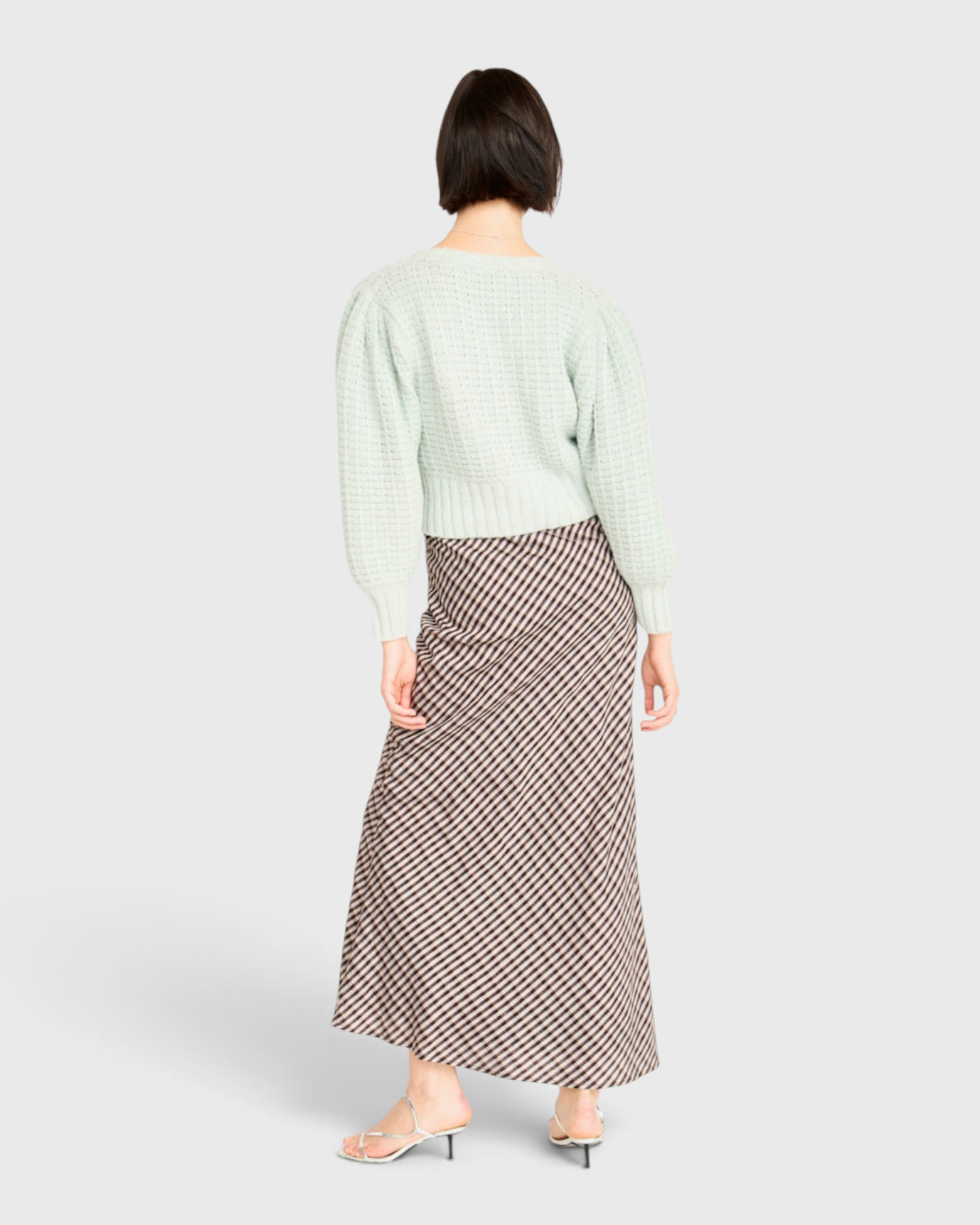 MIRTH Santander Silk Skirt in Shadowline Plaid — worn with a pale green top