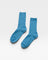 Her Socks in Blue Water